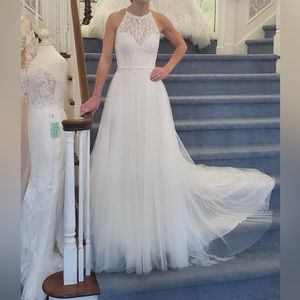 New with tags. Never worn (minus these pics). Went with something different.